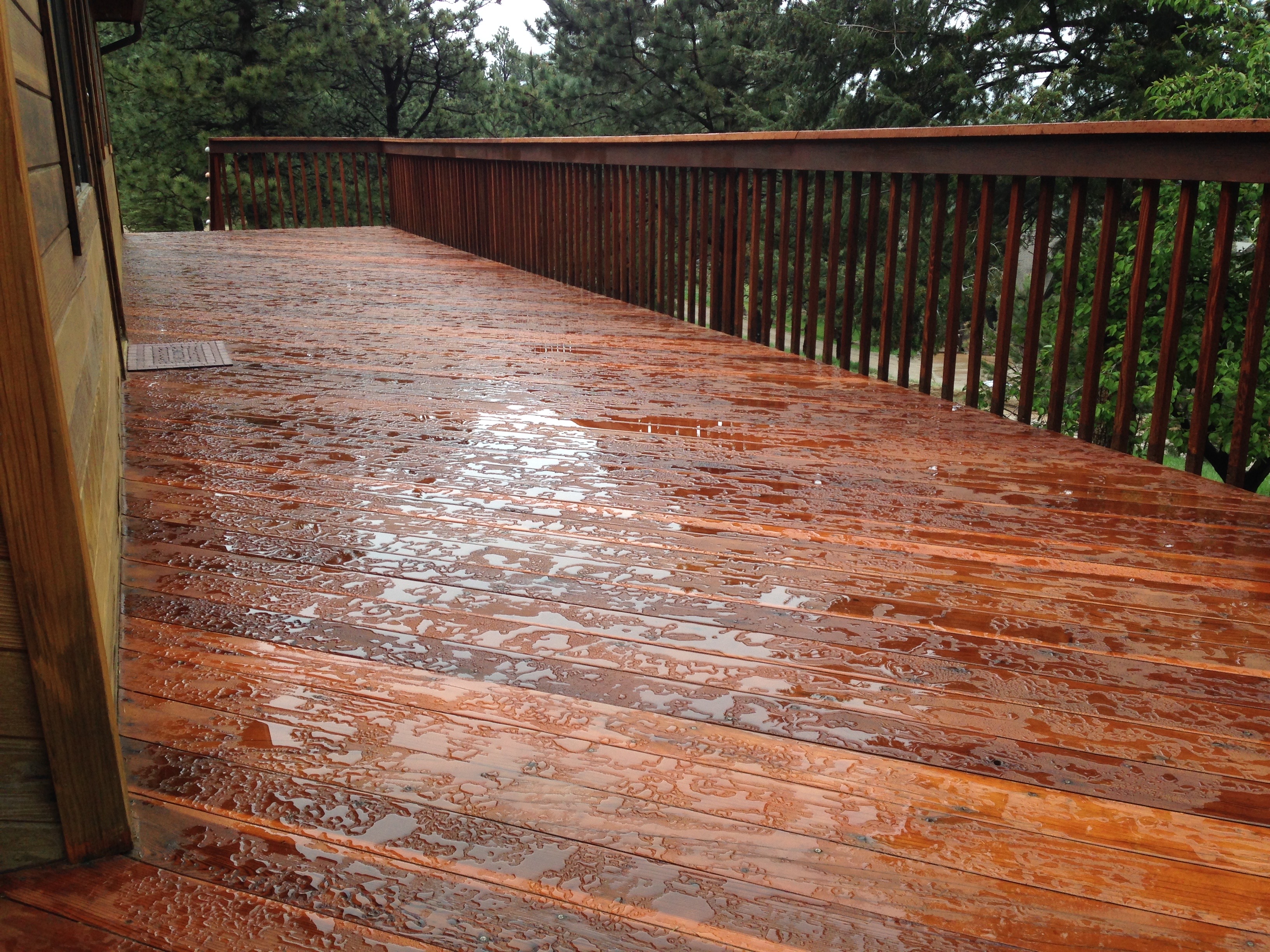 deck refinished with redwood water beading