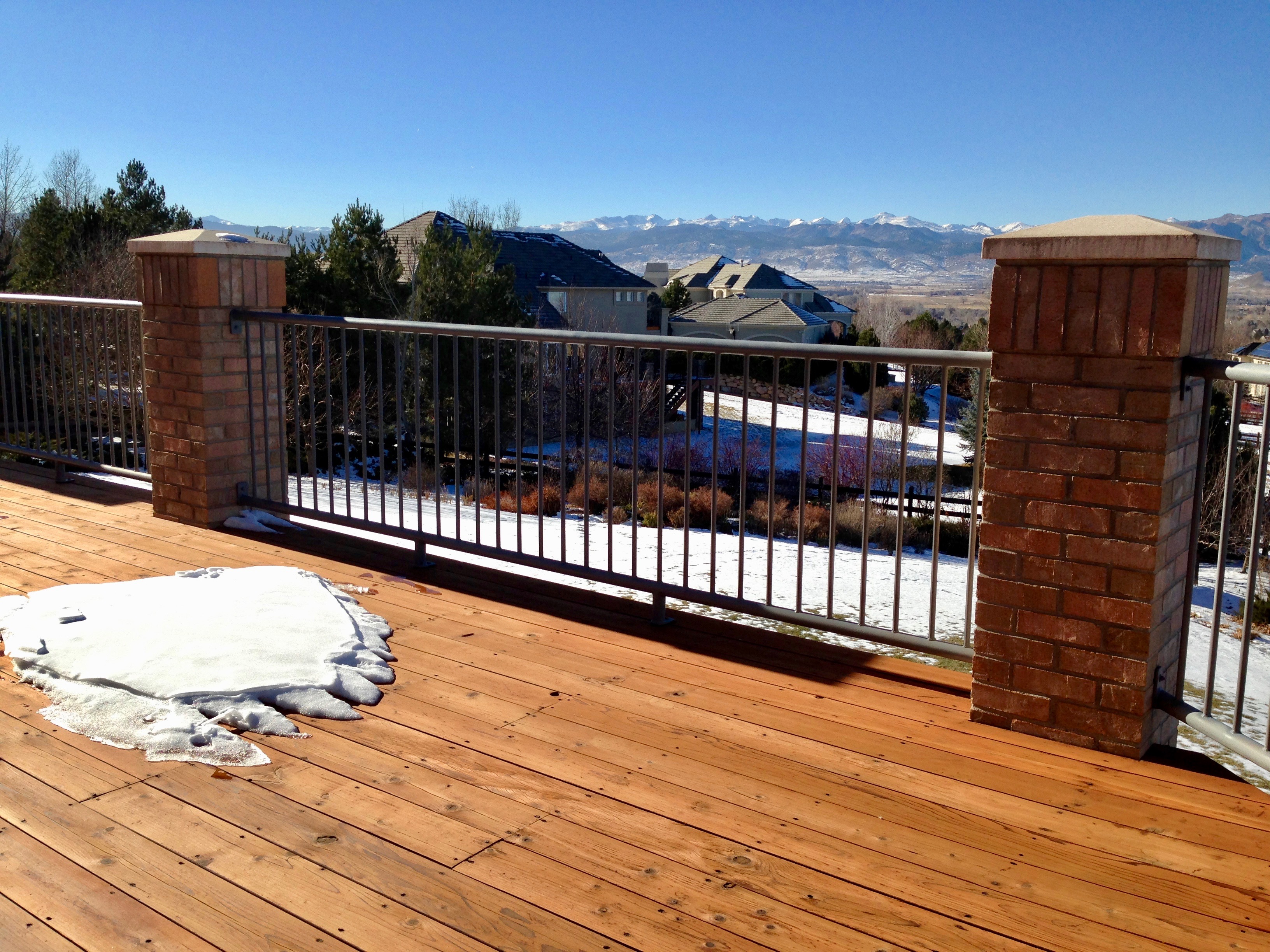Refinished deck with snow