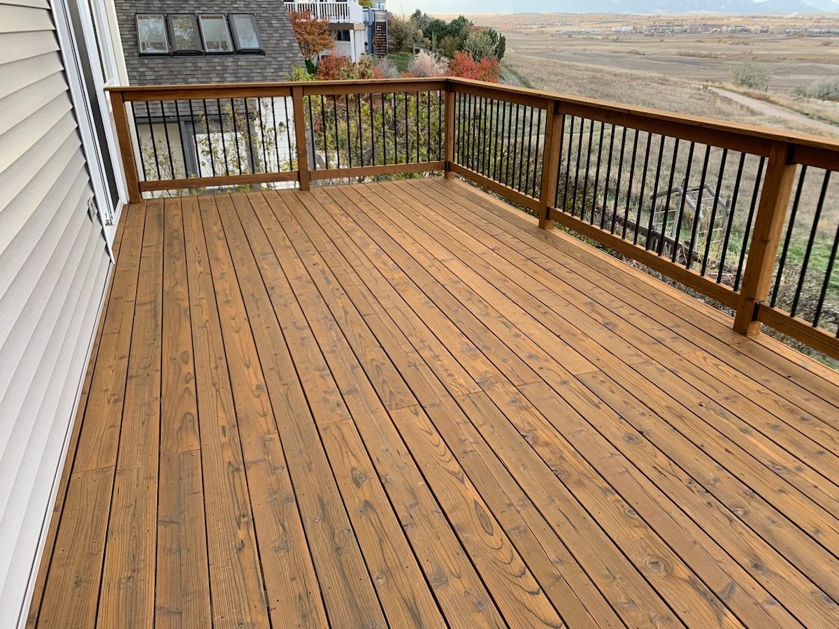 refinished balcony stained with boodge in broomfield co