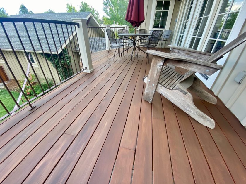 sanded and stained wooden hardwood deck with oil deck stain