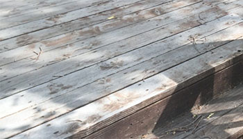 My deck has old faded stain or none at all...